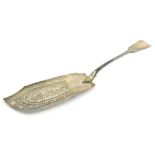 A William IV silver fish slice, Fiddle pattern, with shaped part pierced blade, London 1834, 30cm lo