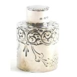 A late Victorian silver dressing table jar and cover, by Atkin Brothers, of cylindrical form, decora
