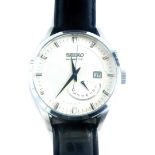 A Seiko Kinetic gentlemans wristwatch, in stainless steel case, numbered 5M84-0AB0, with cream colou