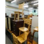 A modern lightwood extending dining table, and four associated chairs, and a two drawer filing cabin