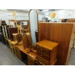 A pine part bedroom suite, comprising a twin pedestal dressing table, cheval mirror, a pair of three