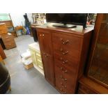 A mid 20thC melamine topped kitchen cabinet, with a single hinged door beside three drawers, 80cm hi