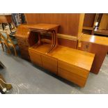 A narrow yew bureau, a mid 20thC teak nest of three tables, a teak two drawer chest, and cabinet.