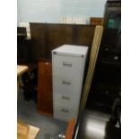 An Officeworld four drawer filing cabinet, a teak two tier occasional table, and an upholstered scre