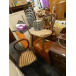 A pair of Victorian mahogany balloon back chairs, with overstuffed seat, on turned and reeded legs,