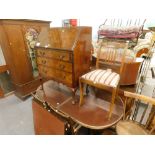 A collection of furniture, to include a mahogany twin pedestal extending dining table, a set of four