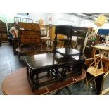 A dark Ercol bedside table, and a nest of three tables.