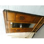 An early 20thC oak single wardrobe, the hinged door inset with a mirrored panel above a single drawe