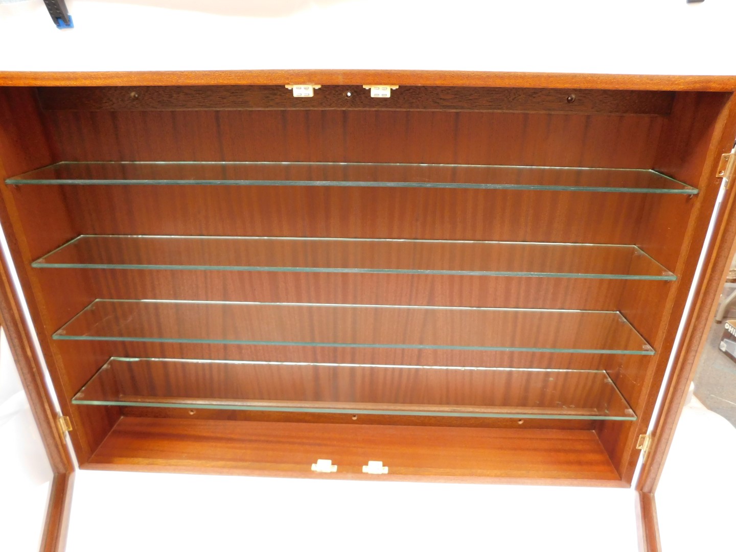 A mahogany two door collector's cabinet, with four glass shelves, 65cm high, 95cm wide, 16.5cm deep. - Image 2 of 2