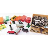 A Hornby O gauge train set, to include a locomotive, coaches and wagons, level crossing, water tank,