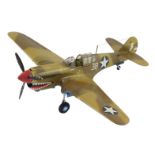 A model of a Curtiss P-40 War Hawk, World War II, Dessert Camouflage, number 38, 20.5cm wide.