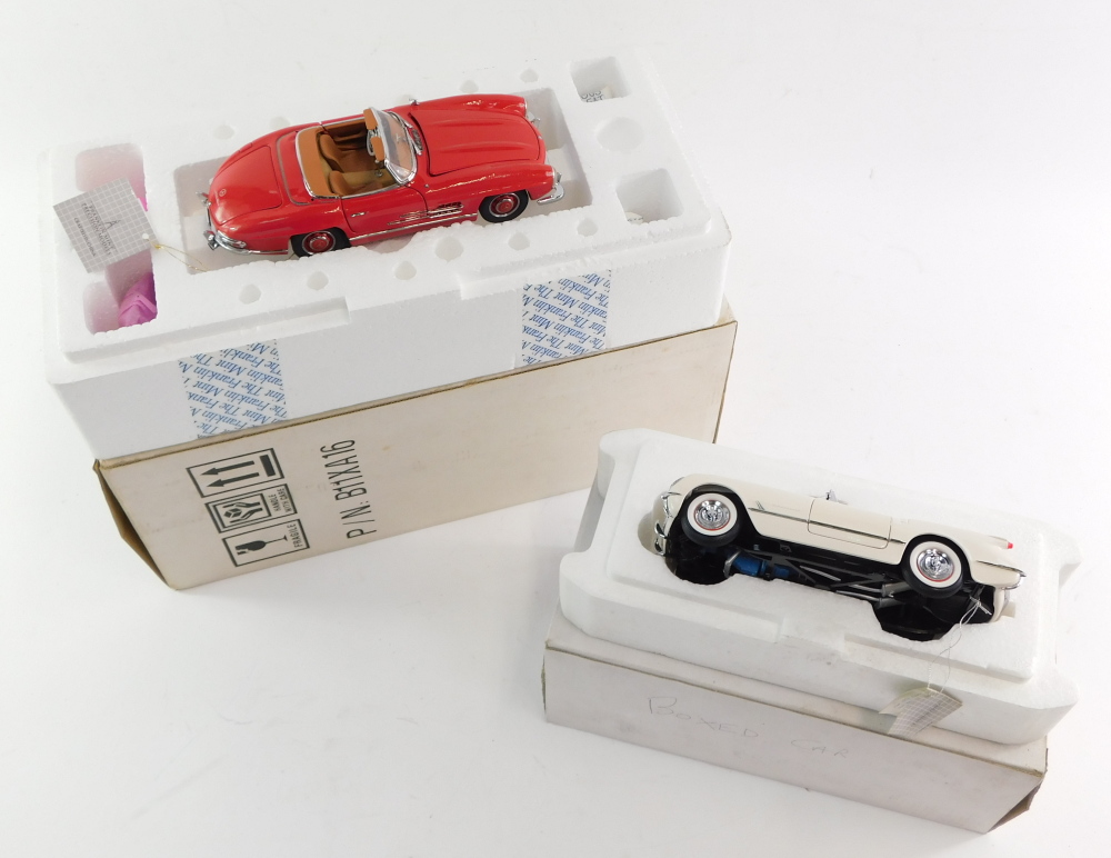 A Franklin Mint die cast model of a 1960 Mercedes Benz 300SL Roadster, together with a 1953 Corvette