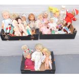 A group of various plastic dolls and accessories, dress, etc. (3 boxes)