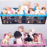 A large quantity of plastic dolls, baby dolls, models, pirate figure, Trolls figures, etc. (4 boxes)