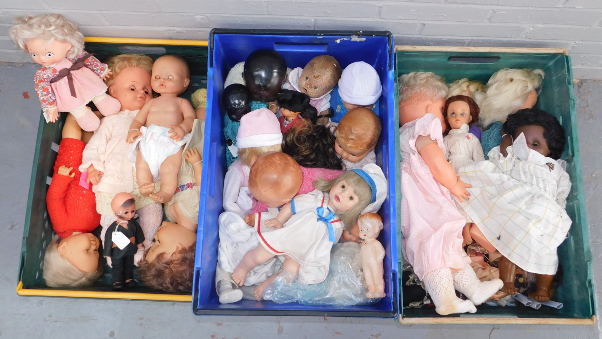 A group of dolls, to include mainly plastic limbed dolls, model of a nurse, figure stamped Piagetti,