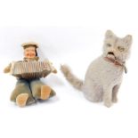 A German early 20thC rag doll, modelled as a sailor boy playing an accordion, 19cm high, together wi
