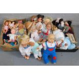 A quantity of dolls, to include mainly plastic modelled dolls, material dolls, crying girls, etc. (3