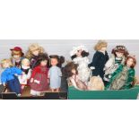 A group of collectors dolls, to include Leonardo collection, ceramic faced dolls, some with stands a