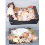 A group of dolls, each with plastic limbs and body, together with a plastic angel type figure, etc.