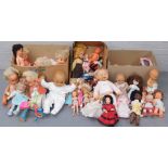 A large quantity of plastic dolls, some Barbie type dolls, etc. (3 boxes)