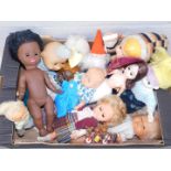 A group of dolls, to include a XGII doll, a Rugs doll, and various others. (1 box)