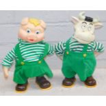 Two plastic rocker models, of a cow and pig in green dungarees, stamped Made In China.