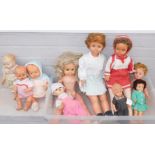 A group of various dolls, to include a plastic headed doll stamped patent number 535811, various