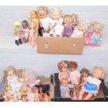 A group of dolls, to include baby dolls, Magic Stroller Baby, plastic figures, babies, etc. (3 boxes