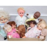 A large quantity of large dolls, each plastic with varying clothing and design. (1 box)