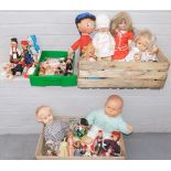 A group of dolls, to include large plastic head babies, a model Noddy figure, Eastern style miniatur