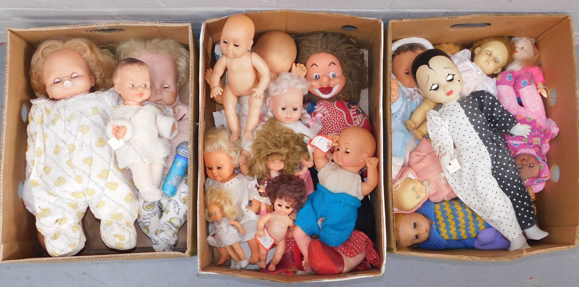 A quantity of dolls, all plastic models, some stamped China, others unmarked. (3 boxes)