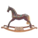 A vintage style carved wooden rocking horse, with horse hair tail, raised on a sleigh type base, 60c