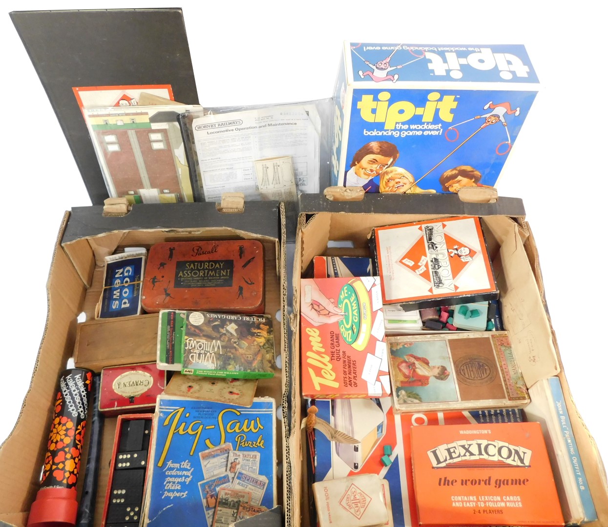 Games and toys, to include Monopoly., Lexicon., Tip It., The Great Game of Britain., and an Illustra