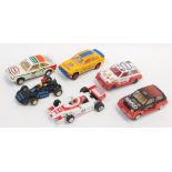 Five Scalextric rally and racing cars, together with Hornby Brabham racing car (6).