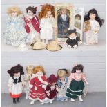 A group of collectors china dolls, some with stands, to include a quantity collection porcelain doll