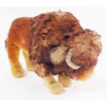 A soft toy figure of a bison, possibly Steiff, 37cm wide.