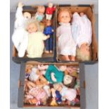 A group of dolls, to include all plastic examples, to include screaming baby, medium size and large,