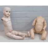 Two doll bodies, to include a paper mache body and a ceramic body with head stamped Germany 16½ Made