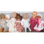 A group of dolls, all plastic limbed, in varying dress. (2 boxes)
