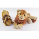 Two soft toy lions, possibly Steiff, comprising a Leo The Lion, and a standing lion with a stitched