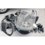 BMW and other body work parts, together with a BMW side pannier. (a quantity)