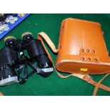 A set of Tohyoh binoculars, in tan leather travel case.