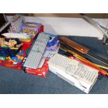 Games and accessories, telescope, cricket bat, two bows, tripod, Brit Quiz, plastic Brio Bricks, etc