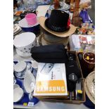 A group of gentleman's hats, cross stitch ware, digital cameras, and Esinor lens, etc. (1 box and 1