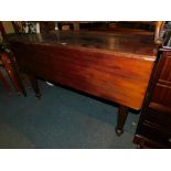 A Victorian mahogany drop leaf dining table, with reeded legs, 121cm wide, 124cm long when extended.