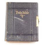The Holy Bible, containing the Old and New Testaments, gilt tooled black cloth, with brass clasp, pu
