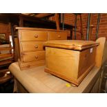 A pine miniature chest of drawers, together with a pine casket. (2)