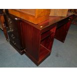 A reproduction mahogany two drawer filing cabinet, with red leather insert, together with a matching