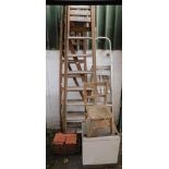 Three step ladders, a child's chair, terracotta tiles, fire basket and a cupboard. (6)