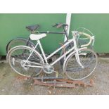 A Raleigh vintage bicycle, together with an unmarked bicycle, black, two sash cramps, etc. (a quanti